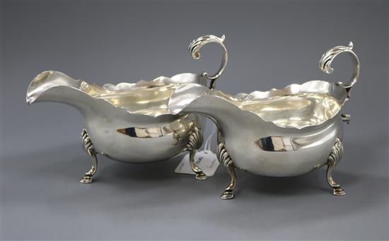 A pair of Georgian style silver sauce boats, Elkington & Co, Sheffield 1911, 17.5 oz.
